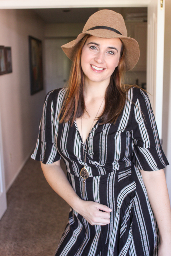 This striped dress and hat makes the perfect stylish mom outfit.